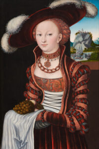Lucas Cranach l’Ancien, Portrait d’une jeune femme tenant des raisins et des pommes, 1528, huile sur panneau, transposée sur toile. Clark Art Institute, don de la fondation Aso O. Tavitian, 2025.1.9